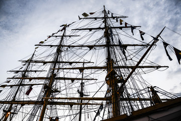Mast and rigging of sailing boat on the blue sky