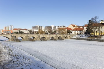 Fototapeta premium The oldest stone bridge in central Europe above River Otava, Pisek, Czech Republic
