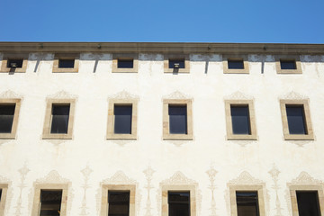 Fototapeta na wymiar Detail of facade of Charity House (Casa de la Caridad), located in Raval near Barcelona University, MACBA and CCCB in Barcelona, Spain