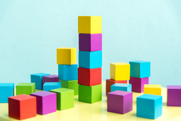 Obraz premium Colorful stack of wood cube building blocks