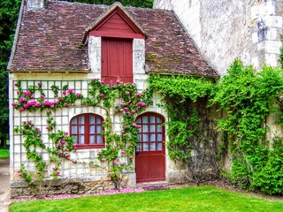 Fototapeta na wymiar A picturesque French cottage in the village France