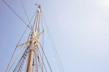 Detail of mast's ship on a sunny day with blue sky