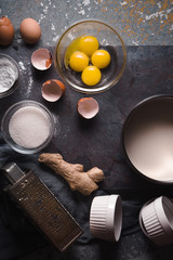 Ingredients for Catalan cream on the stone background vertical