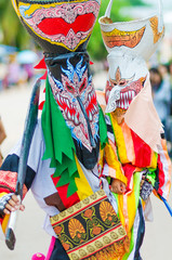 Ghost mask and costume colorful Phi Ta Khon festival  on June  Young people dress in spirit and wear a mask, sing and dance at Loei province Thailand.