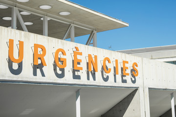 Emergency placard of public health service of Hospital del Mar in Barcelona, written in catalan language