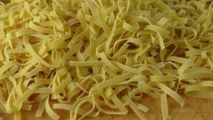 Healthy pasta on a rustic wooden table,homemade egg noodles
