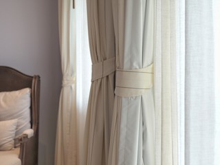 Curtain and window interior decoration in living room with sunlight.