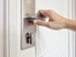 Hand man and modern door handle