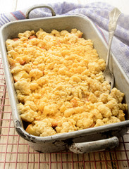 british apple crumble in a baking tray