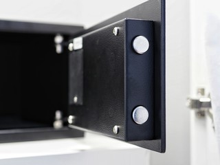 Safety box in hotel cabinet. Concept of security and protection treasure.