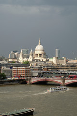 St Paul's Cathedral, London, UK with Blackfriars Bridge and the River Thames in the foreground.