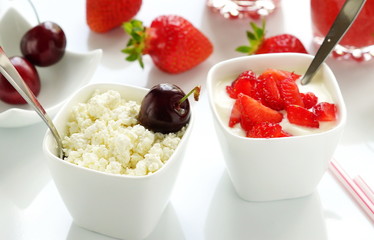 delicious desserts with strawberries and sweet cherry curd, yogurt on a white background
