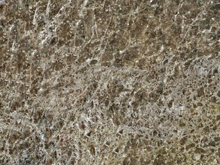 Brown marble stone seamless pattern background for both exterior and interior design on luxury wall or floor.