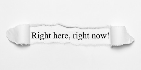 Right here, right now! on white torn paper