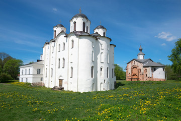 View of St. Nicholas Cathedral and church off Paraskev Fridays in the sunny May afternoon. Veliky Novgorod, Russia