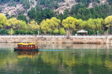 boat in Yi river and waterfront on East Hill