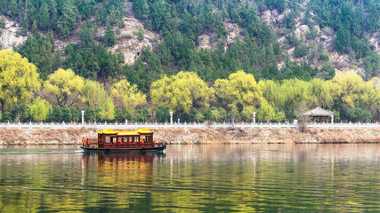 Fototapeta premium view of ship in Yi river and green East Hill