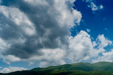 Obraz premium Mountain with white cloud on Blue sky