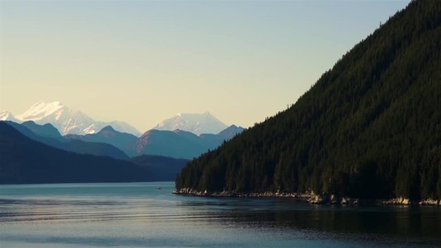 Fishing Boat Along Alaskan Mountains - Dramatic Camera Move
