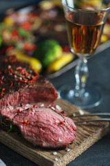 Pepper beef steak with vegetables on background 
