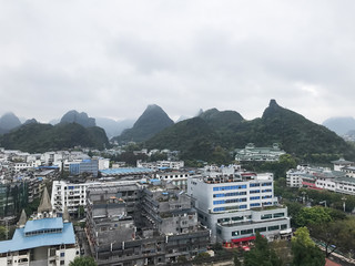 above view of Guilin city and green mountains