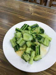 salad from fresh cucumbers in cheap eatery