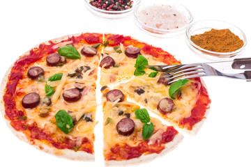 Pizza with sausages and cheese on white background