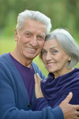 senior couple hugging 