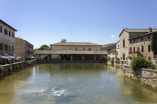 The small medieval town of Bagno Vignoni in Italy, with its hot spring thermal bath