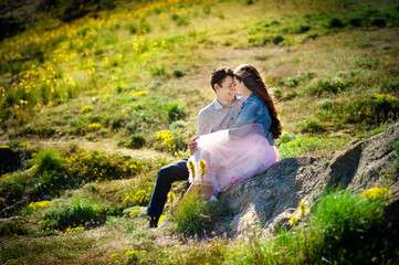 Young couple in love outdoor. They are smiling and looking at each other. happy lifestyle concept