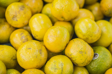 oranges fruit on market stall,with chinese new year background, in market,selective focus.