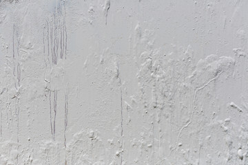 Metal background painted with white paint.