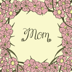 Hand lettering Mom made on floral background.