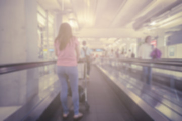blurred background of passenger at the airport, People walking in the airport with retro filter effect