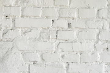 White brick wall texture. White background. Old masonry painted white