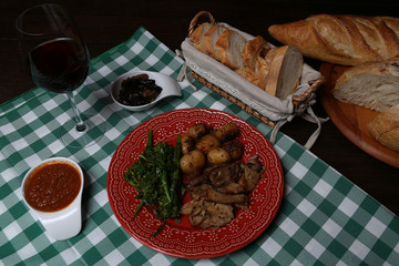 Italian dinner with breads, water and wine, table tidy