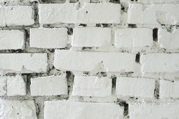 White brick wall texture. White background. Old masonry painted white