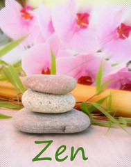 Obraz na płótnie Canvas zen sur pile de galets et bambou ,orchidée rose