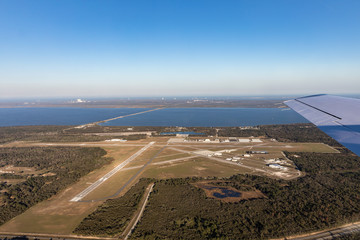 Aerial view of the airport in Titusville, behind the building Nasa at Kennedy Space Center, Cape Canaveral. Florida, USA - obrazy, fototapety, plakaty