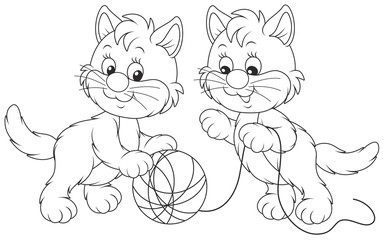 Little kittens playing with a clew of yarn
