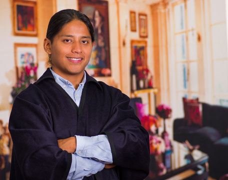 Close Up Portrait Of Young Indigenous Man Wearing Traditional Clothes From The Highlands In Ecuador