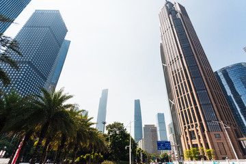 Fototapeta premium skyscrapers along street in Guangzhou city
