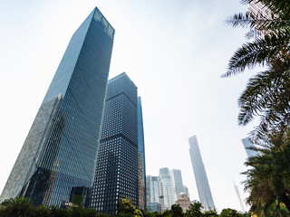 Fototapeta premium modern buildings on street in Guangzhou city