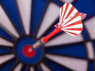 Dart targeting center of Bulls eye