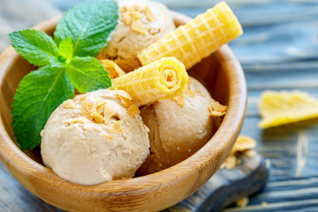 Homemade caramel ice cream and waffles closeup.