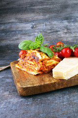 Serving of spicy traditional Italian beef lasagne in a restauran