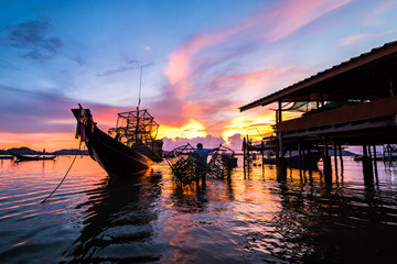 Fishing boats and fishing village sunset