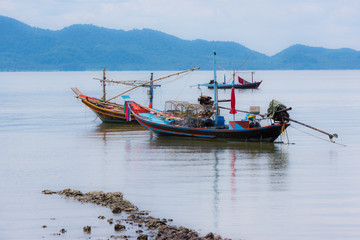 Floating fishing boat in the sea