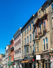 Fototapeta na wymiar Buildings on Saint Jean Street in Quebec City, Canada