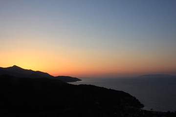 Sunset over Elba and Capraia islands, Tuscan archipelago, Italy